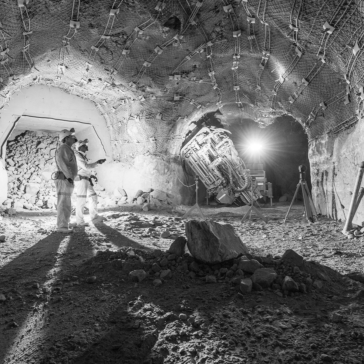 Miners Standing in an Underground Mine