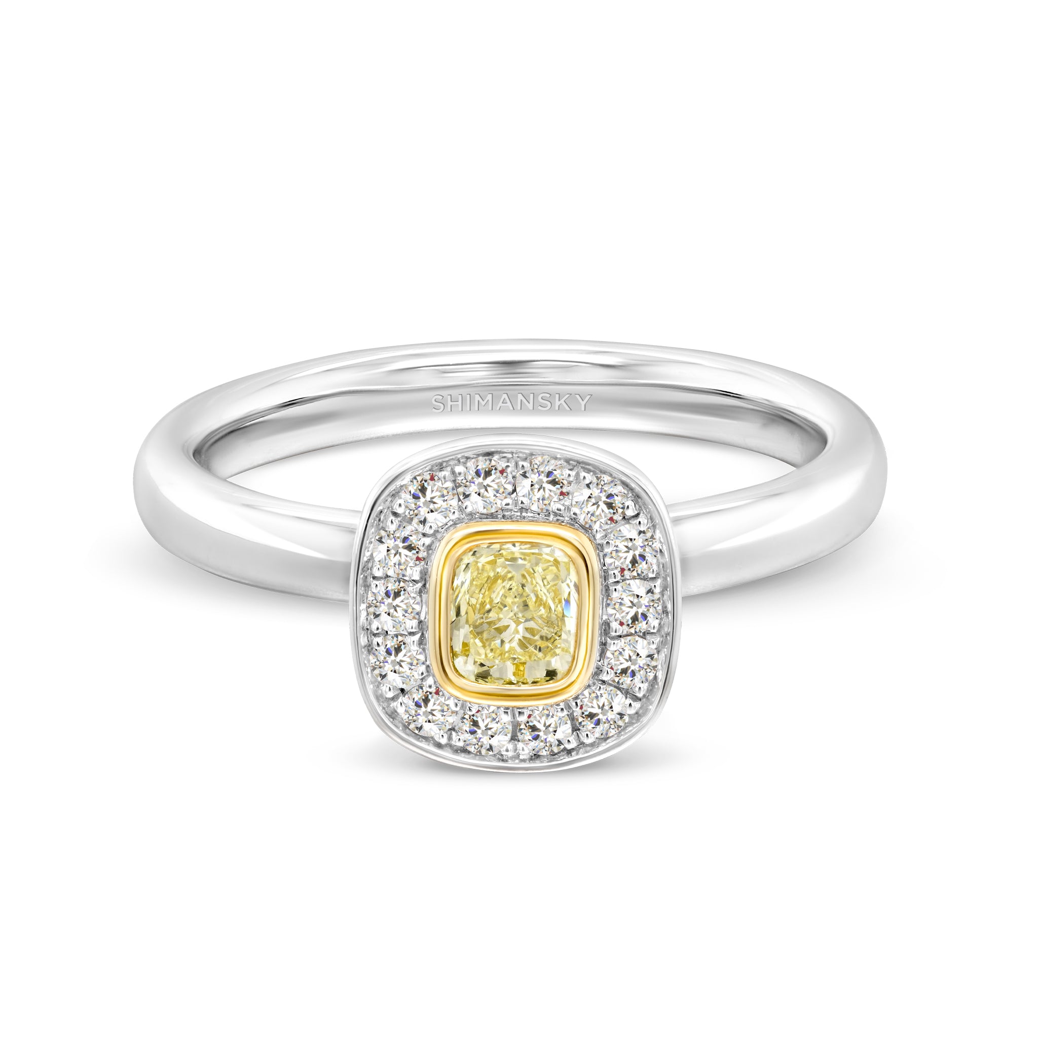 Необычное кольцо с желтым бриллиантом