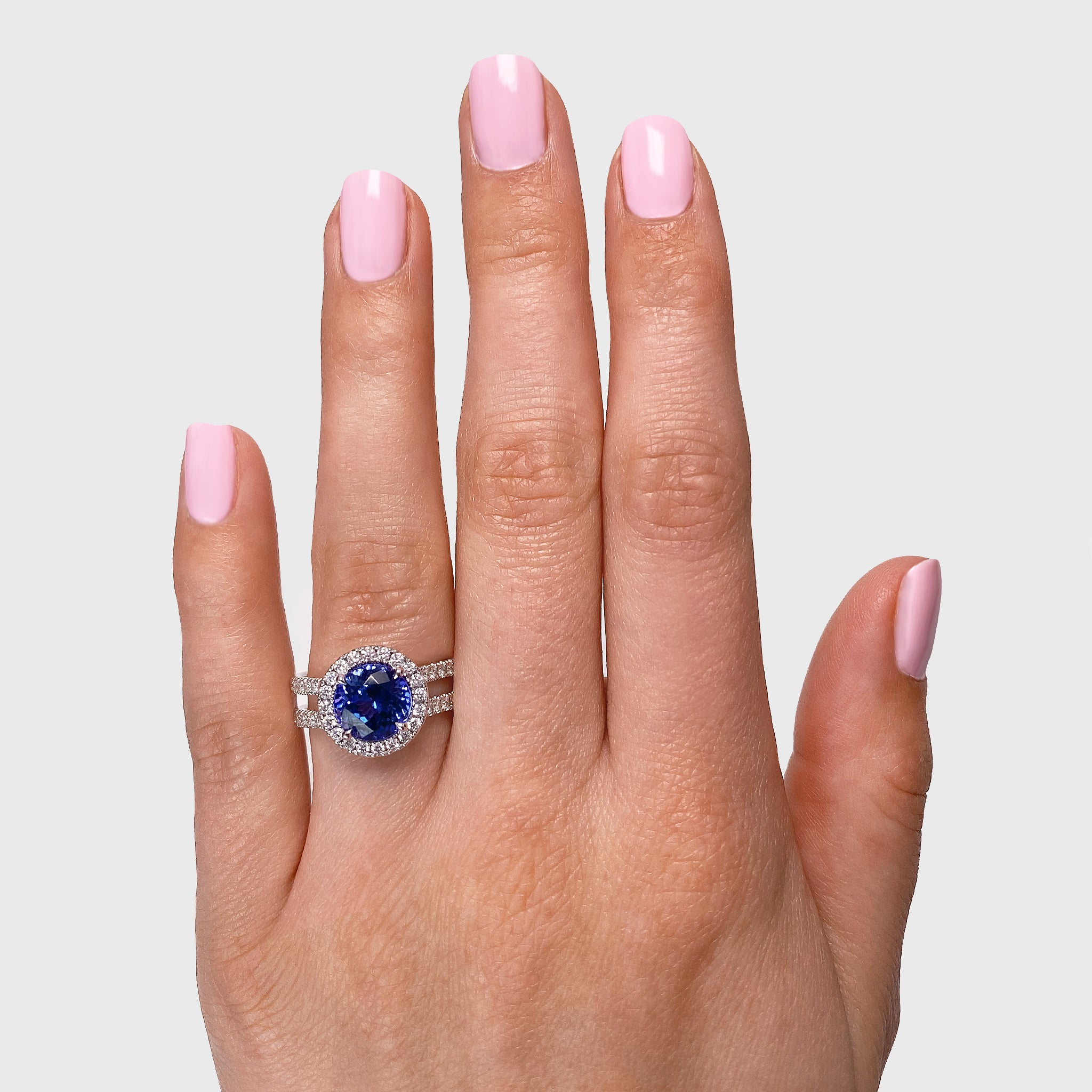 Shimansky - Women Wearing the Tanzanite and Diamond Double Microset Halo 2.50ct ring crafted in 14K White Gold