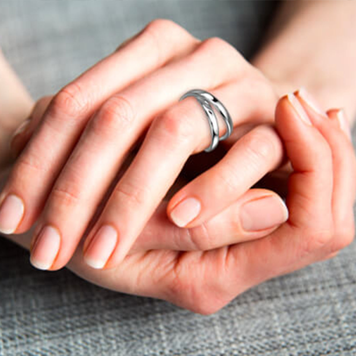 Woman's hands with the Infinity Ring on her finger