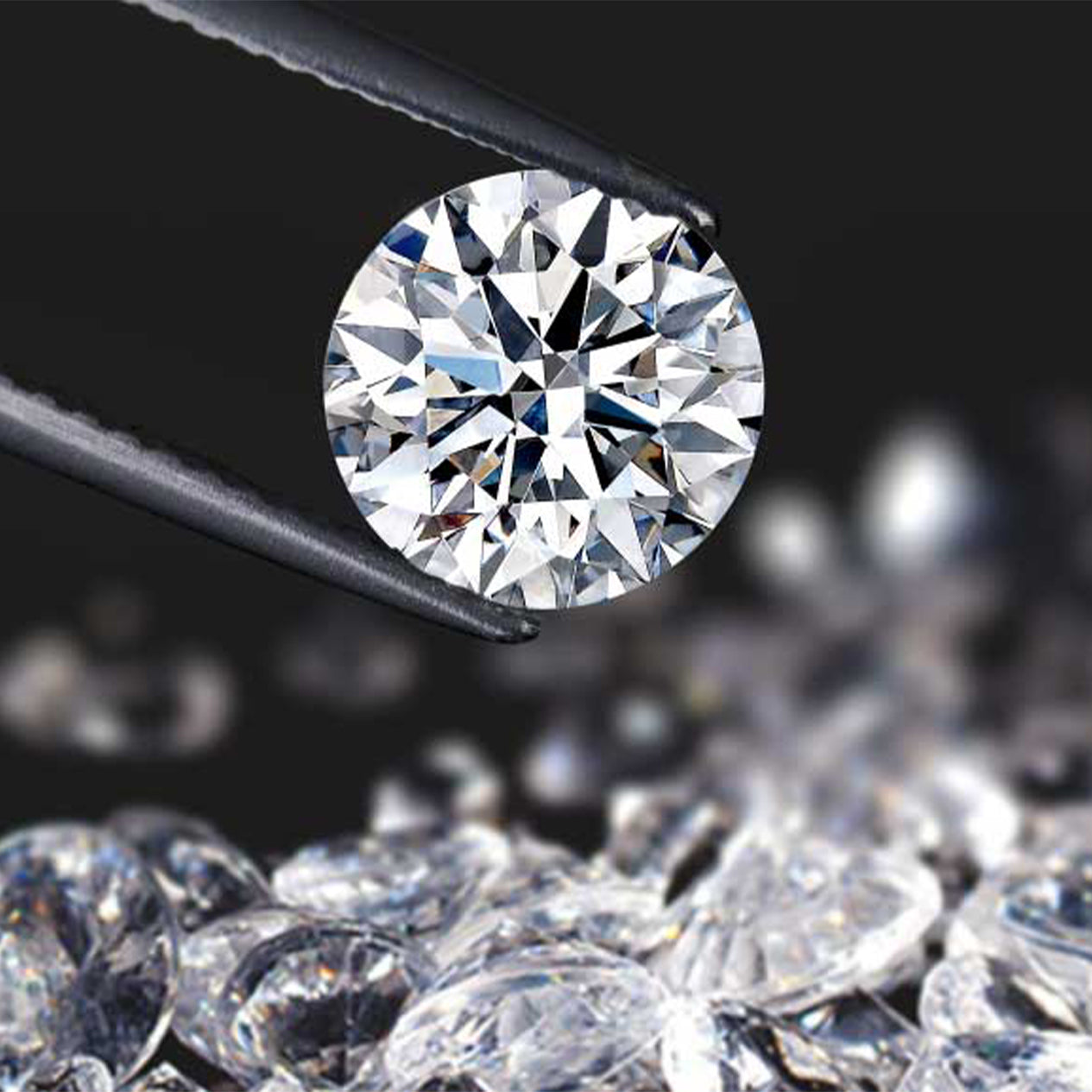 Shimansky picking up a cut diamond within loose diamonds