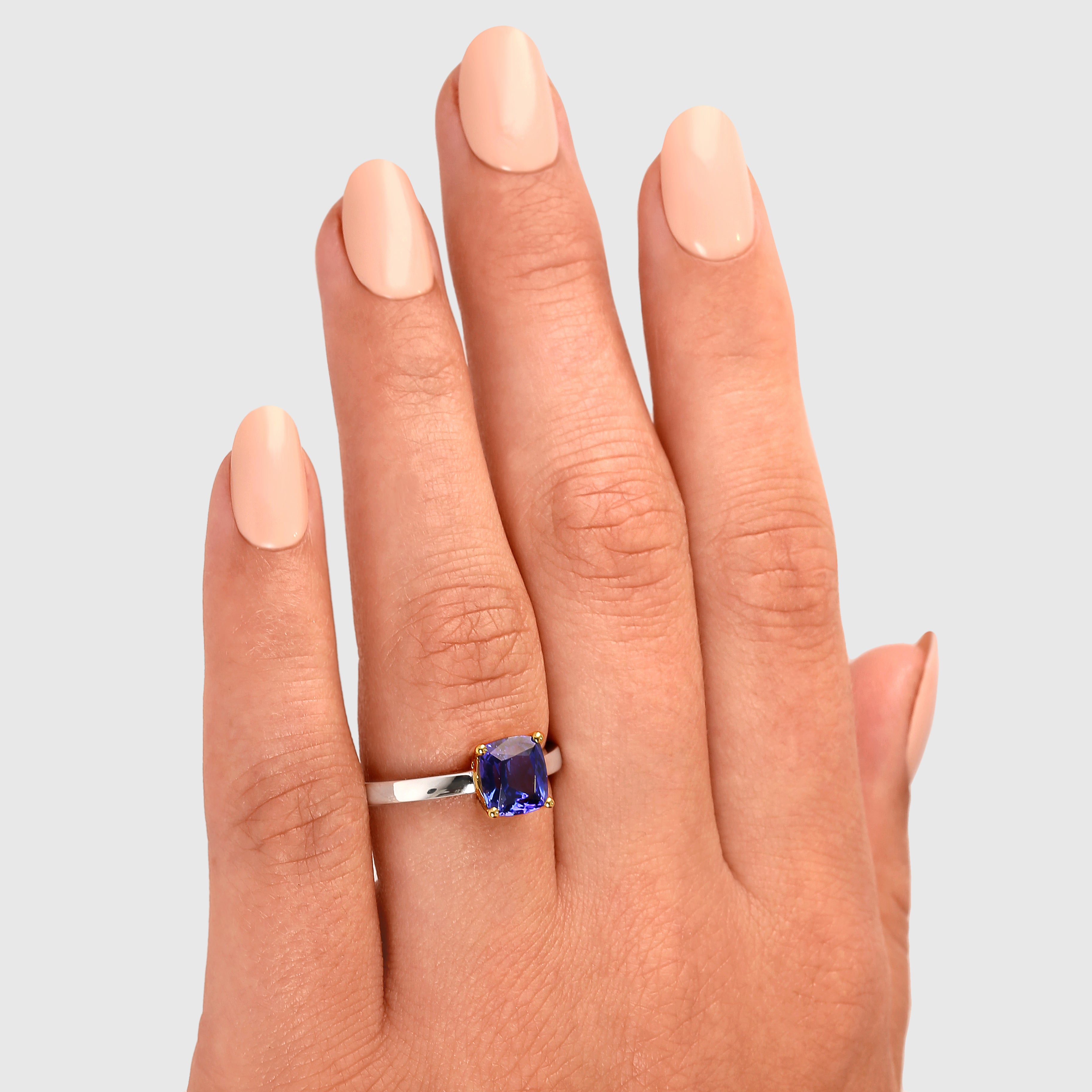 Shimansky - Women Wearing the Tanzanite Cushion Cut Solitaire Ring 1.70ct crafted in 18K White and Yellow Gold